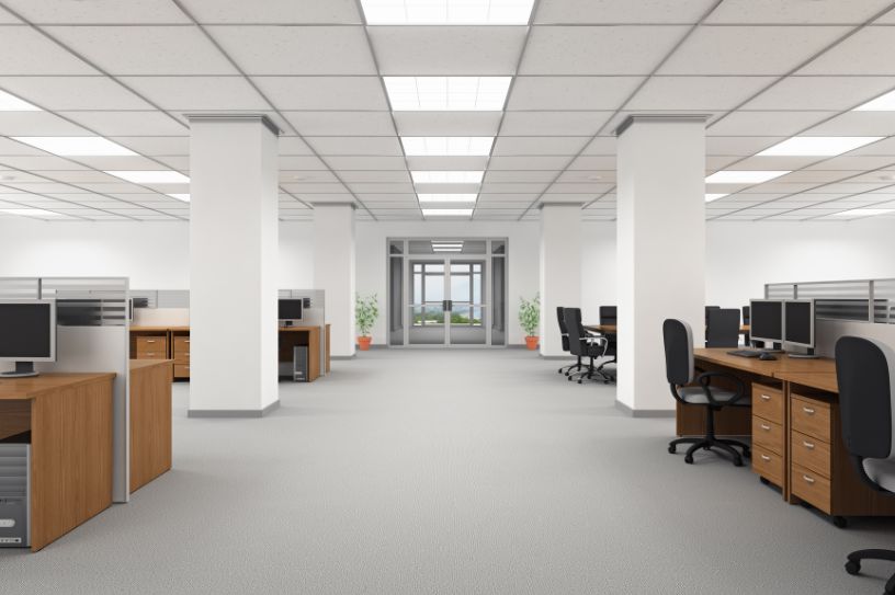 office lighting design with grid ceiling and workstations