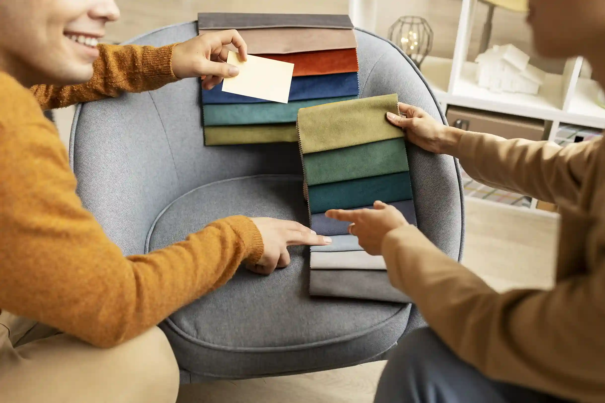 interior designers choosing fabric swatches
